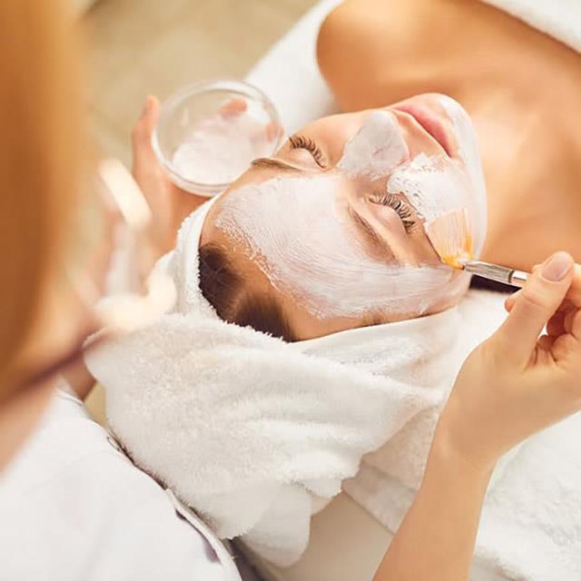 a woman receiving a spa treatment